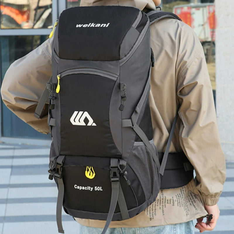 wanderrucksack 50 liter auf dem rücken getragen - Orange - Schwarz - Marineblau - Rot - Grün