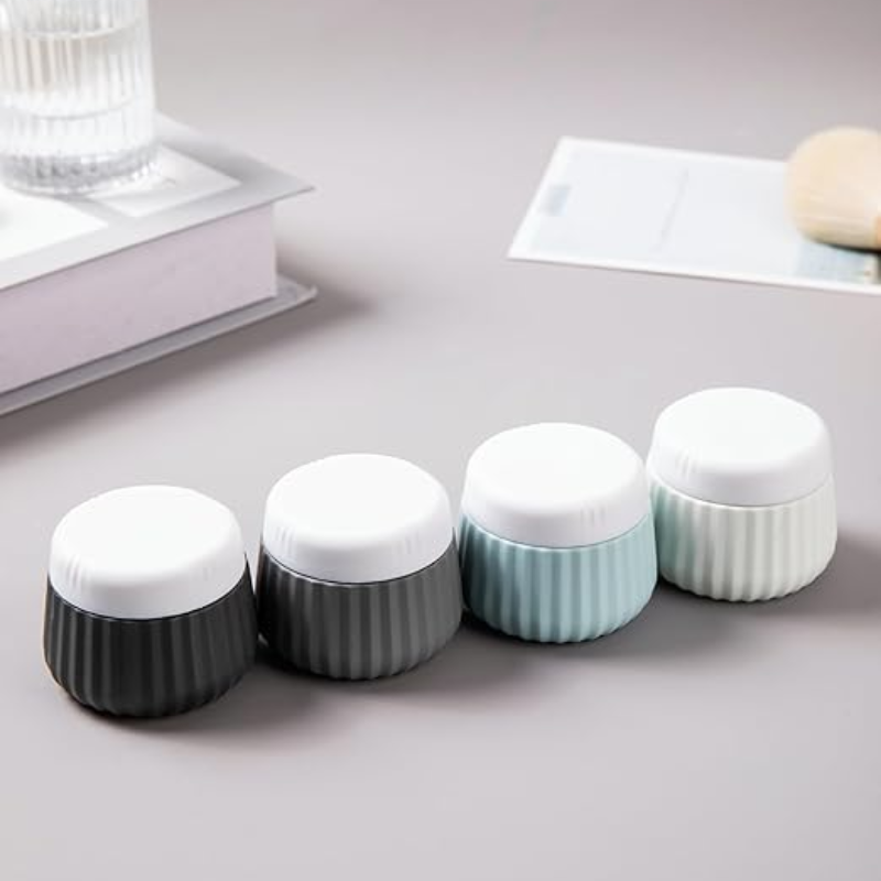 leere reise flasche für creme vier flaschen ausgerichtet - Beige - Rosa - Grün - Blau - Mehrfarbig