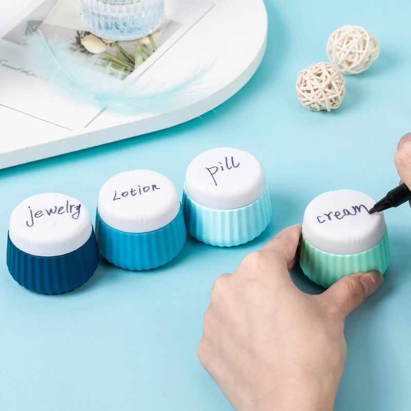 leere reise flasche für creme vier flaschen ausgerichtet - Beige - Rosa - Grün - Blau - Mehrfarbig