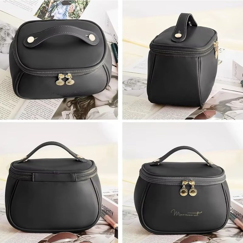 Trousse de toilette femme PU noire, détails poignée et fermeture éclair